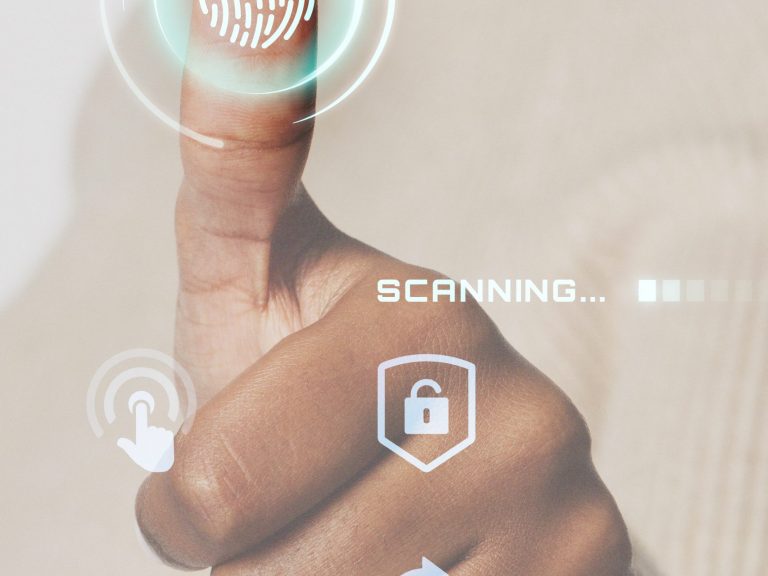 Woman scanning fingerprint with futuristic interface smart techn